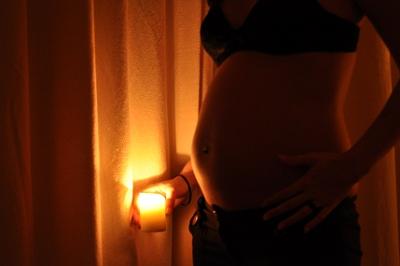 Pregnant Belly by  Candlelight